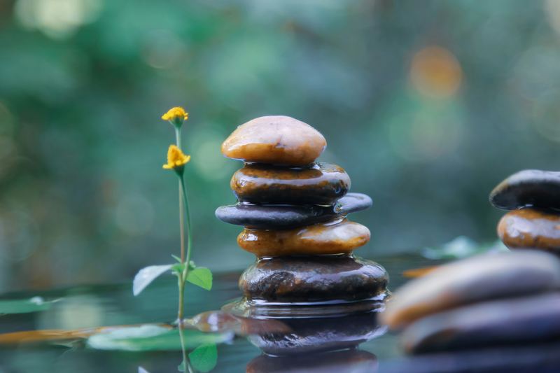 Calm stones, representing clarity about therapy fees